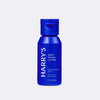 Blue bottle of Harry's daily facial lotion on a light gray background